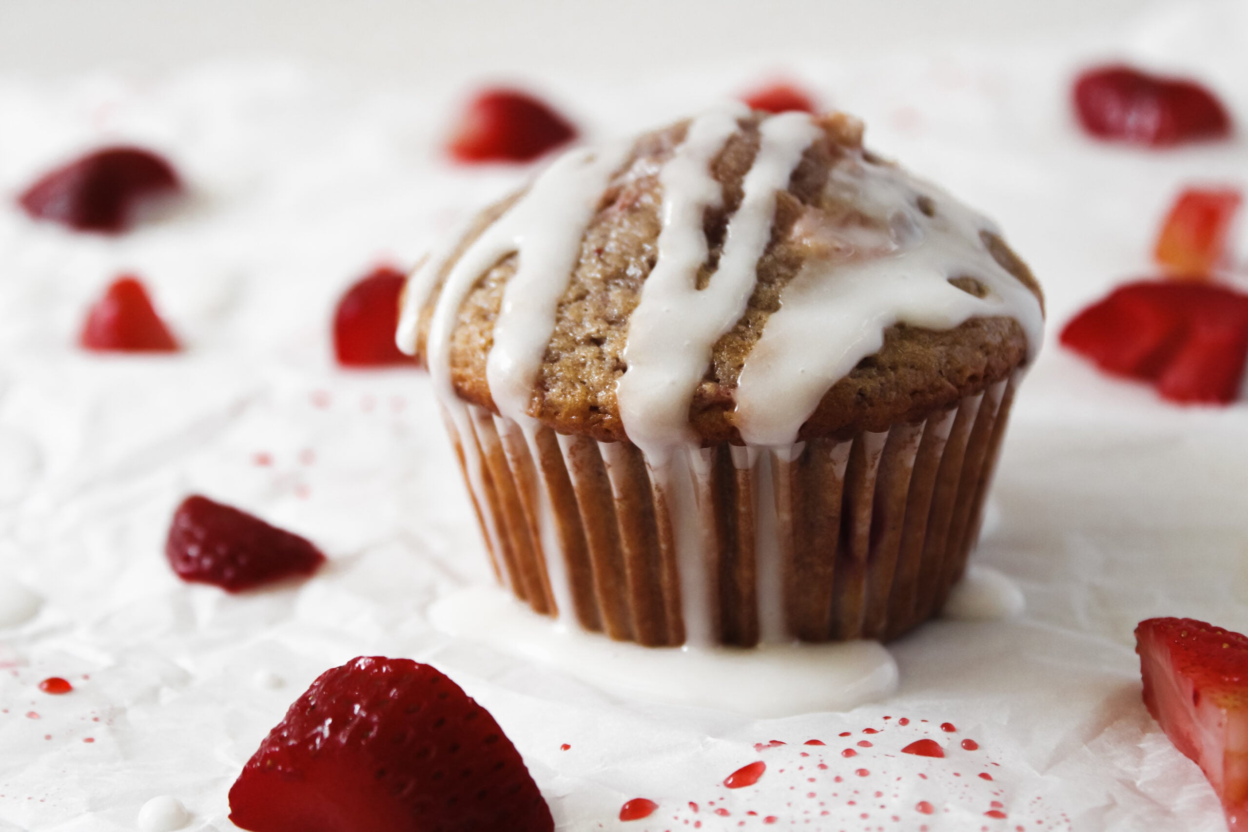 Simple Strawberry Muffins (So Easy, So Good!) with fresh strawberries.