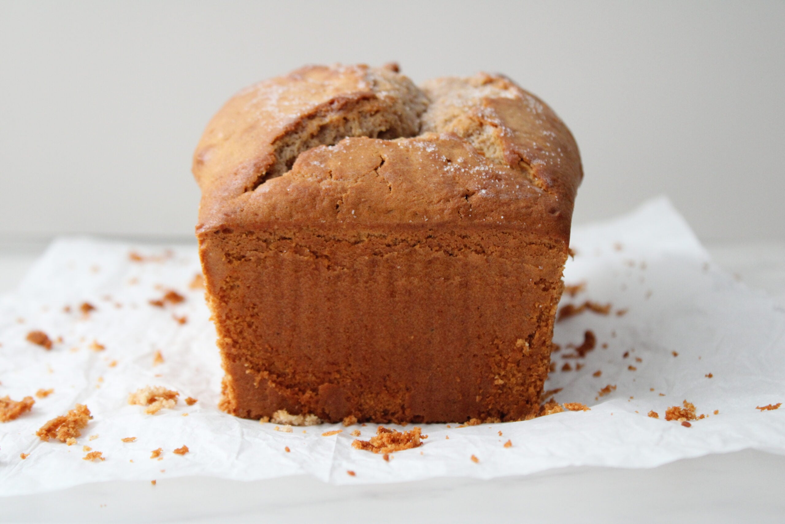 Fully baked raspberry swirl bread loaf.