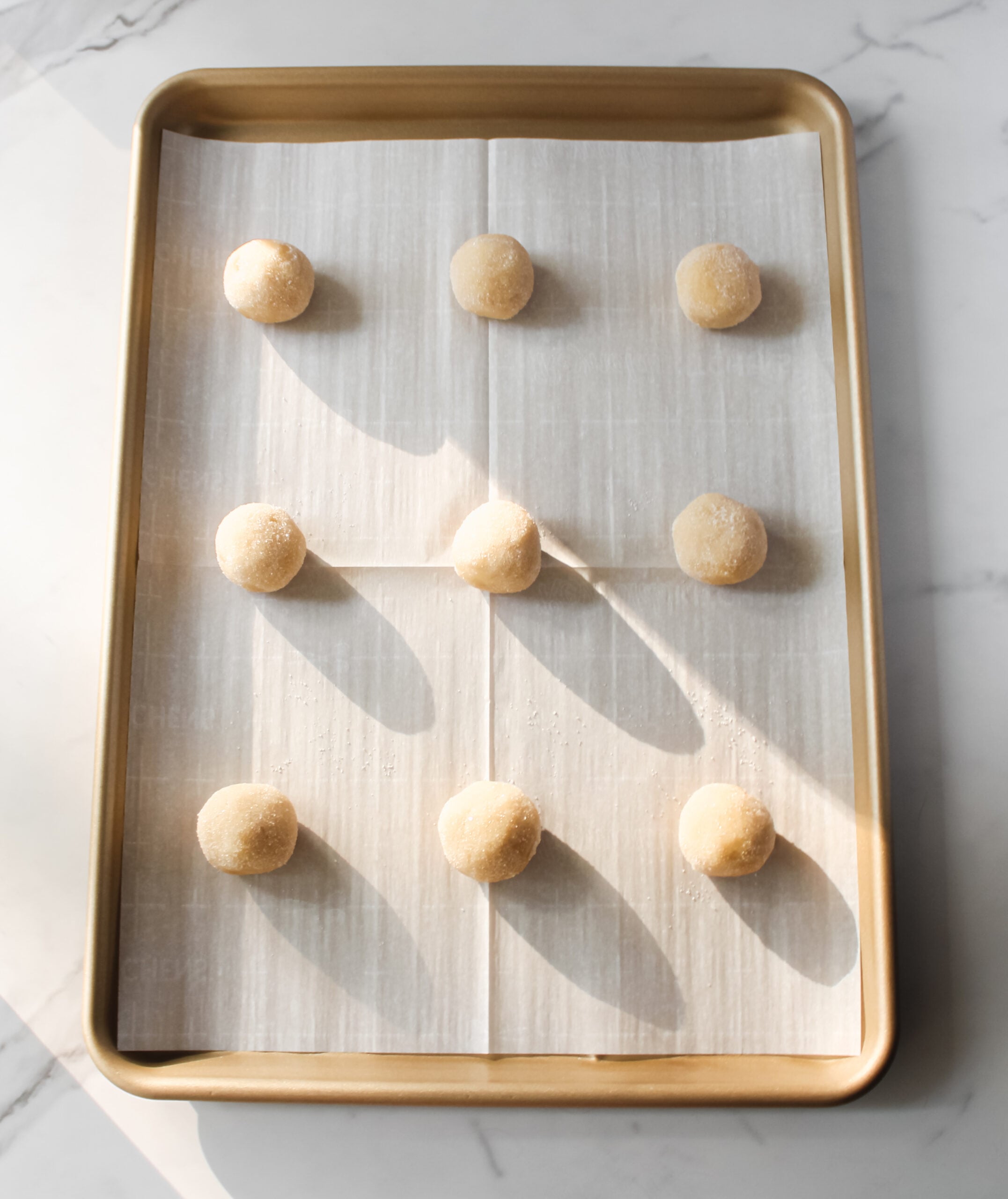 Sugar Cookie dough on a baking sheet.