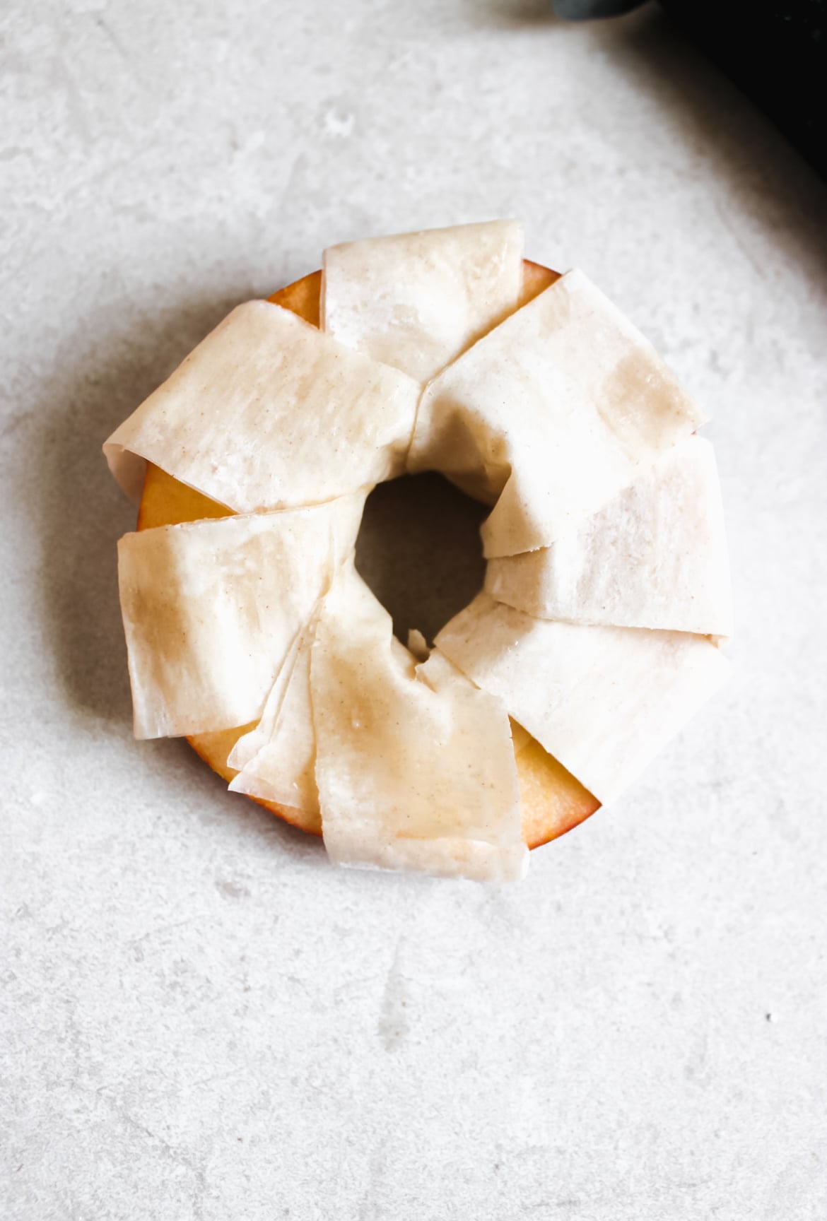 Sliced apple wrapped in phyllo dough