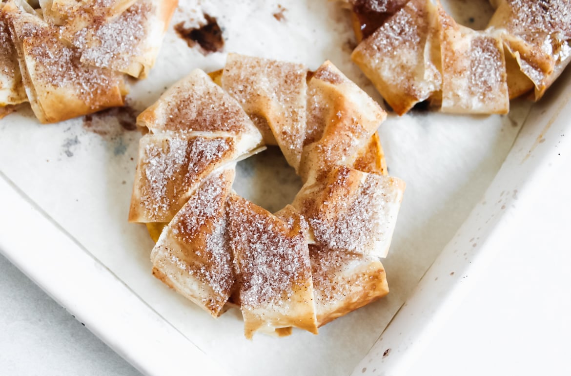 Apple strudel slices on a baking sheet.