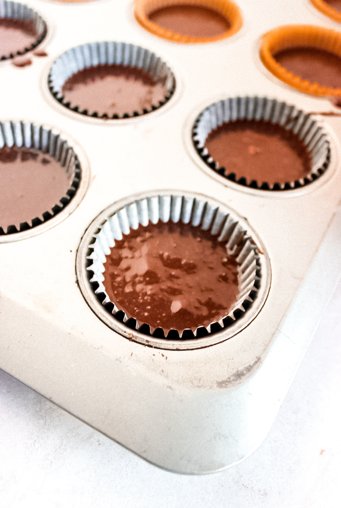 Hot Chocolate cupcake batter in a baking pan.